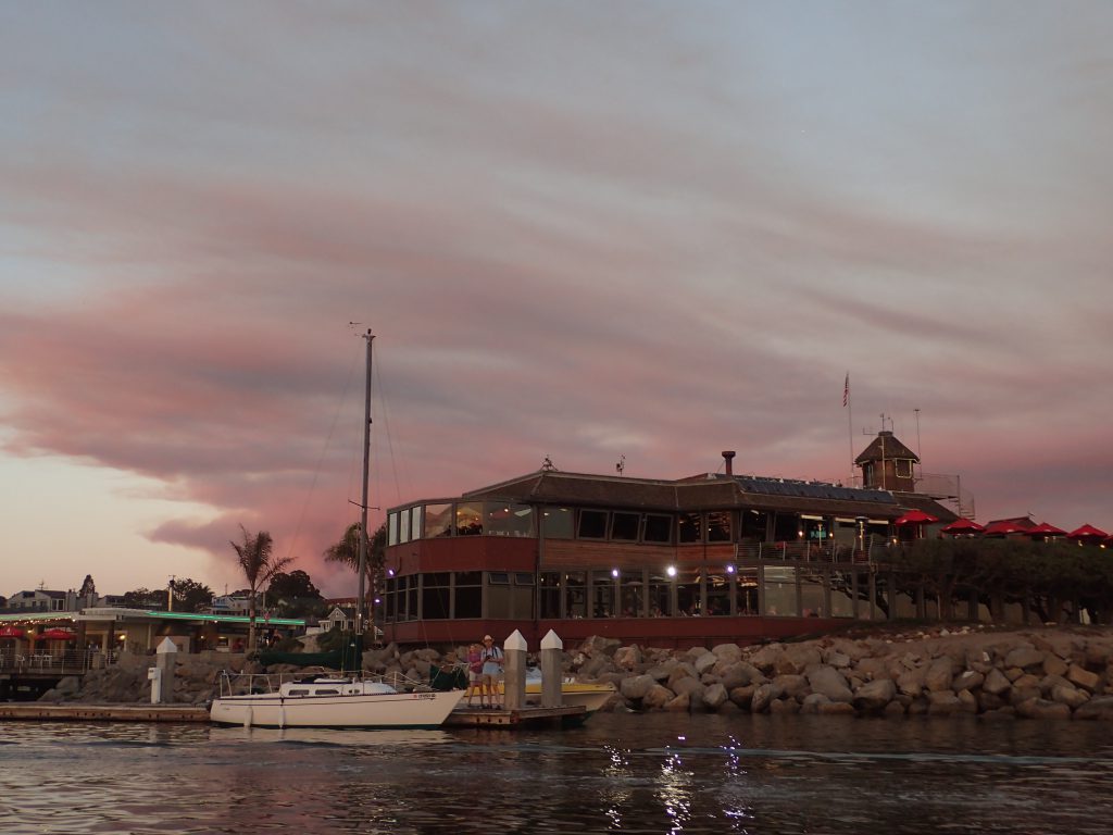 The Crow's Nest restaurant at the Santa Cruz Yacht Harbor, with the Loma Fire burning in the background. 26 September 2016 © Allison J. Gong